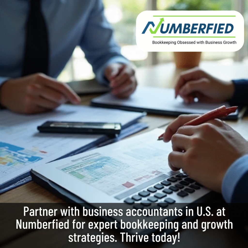 Two people reviewing financial documents and graphs at a desk, promoting Numberfied’s bookkeeping and growth strategy services for businesses in the U.S.