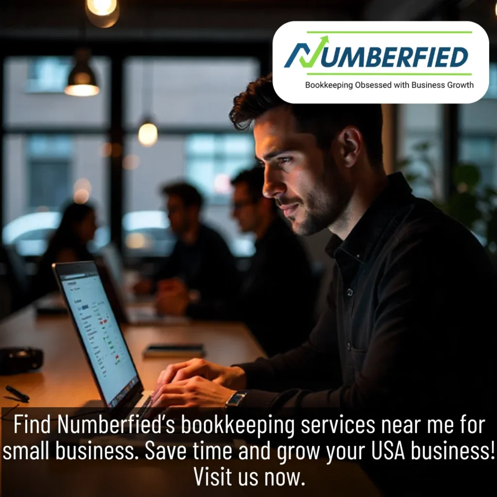 Professional handling bookkeeping tasks at desk as colleagues collaborate, showing bookkeeping services near me for small business.