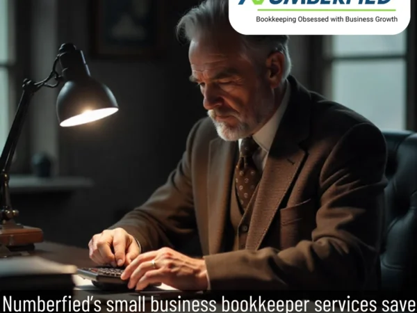 Experienced bookkeeper doing calculations, representing professional Small Business Bookkeeper Services.