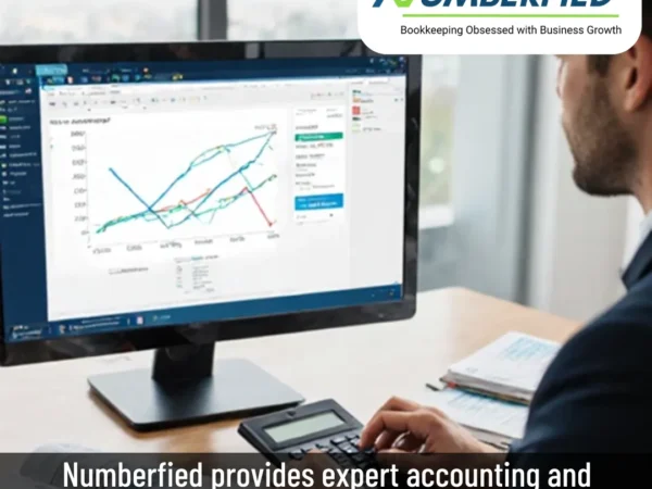 Employee reviewing charts to provide accounting and bookkeeping services for construction companies