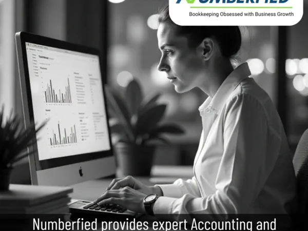 Accountant reviewing spreadsheets to manage taxes and payroll with accounting and bookkeeping services USA.