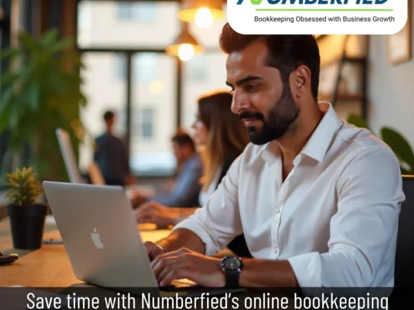 A professional uses digital tools to manage accounts, showcasing online bookkeeping services for small business.